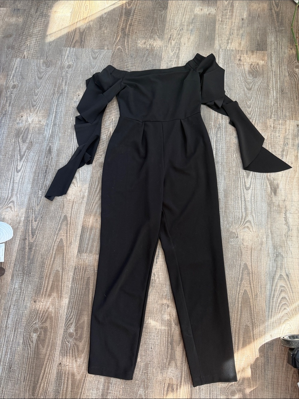 Elegant Black Jumpsuit with Twist Sleeve
